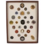 Buttons - a framed display of twenty nine, glass Bimini buttons, various shapes, sizes and