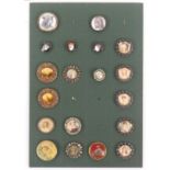 Buttons - a card display of nineteen 19th Century buttons mostly depicting portrait busts within