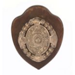 A silver military presentation shield, on oak plaque 'Aldershot Command Athletic Association -