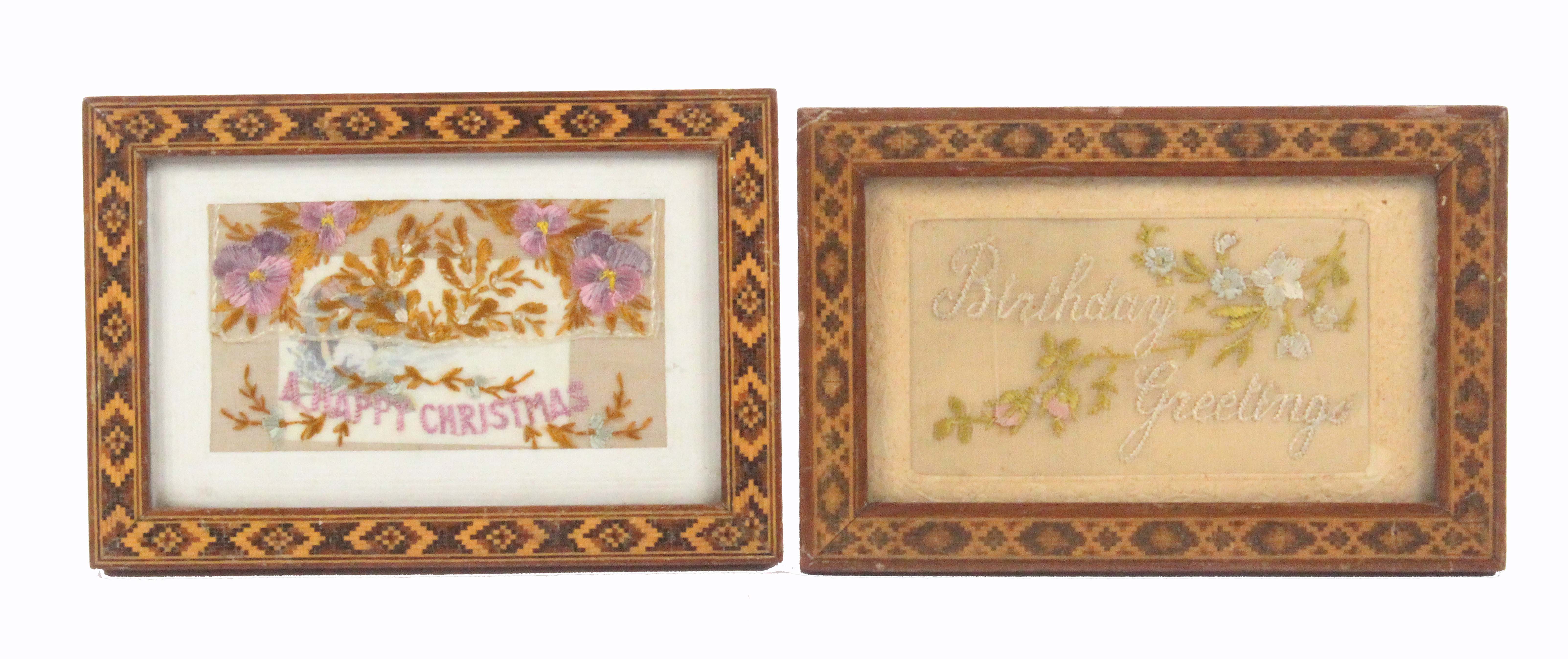 Two Tunbridge ware geometric mosaic border rectangular picture frames, each containing a WW1 silk