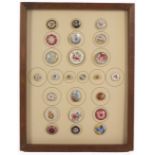 Buttons - a framed display of twenty four, porcelain buttons mostly 19th Century but including two
