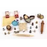 A mixed lot including a mother of pearl diamond pattern card case, a damagedÊmeerschaum pipe as a