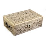 An exceptional Chinese export ivory sewing box, circa. 1820, of rectangular form each surface deeply