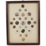 Buttons - an attractive framed display of twenty five buttons, comprising a silver mask example,
