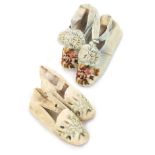 Two pairs of 19th Century silk and floral embroidered baby shoes, each pair with leather soles and