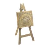 A polished brass Avery needle packet case, The Easel, the folio with basket of flowers, only two