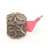 An attractive late 18th Century English silver filigree tape measure of cylinder form, quill work