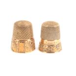 An American gold thimble and another, the first stamped to the internal apex '10K' the engraved