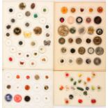 Buttons - four carded displays, comprising a card of thirty celluloid or similar, largest 5cm,