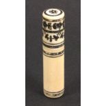 A 19th Century ivory Anglo Indian needle case, of cylinder form decorated with bands and flowers