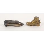 Two novelty vesta cases, comprising a white metal example as a lady's shoe, 8.5cm, and a brass