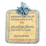 A large pin card sampler, of square form worked in blue with upper and lower case alphabets and