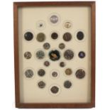 Buttons - a framed display of twenty five, including a domed enamel under glass with floral