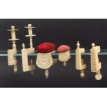 A collection of six 19th Century bone and ivory sewing clamps, including two Canton bone examples,
