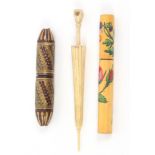 Three needle cases, comprising a floral painted Spa work cylinder example, 8.5cm, a split and