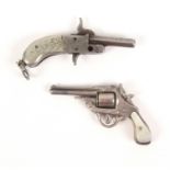 Two late 19th/early 20th century key ring pistols one in the form of a revolver with mother of pearl