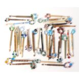 Thirty one assorted lace bobbins, in various materials including some modern commemoratives. (31)