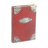 A French 'Souvenir' note book and calendar, 1829, the grained red leather covers with pierced