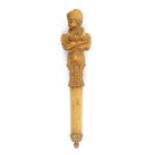 A good French carved boxwood figural needle case, the cylinder body below a waist length figure of a