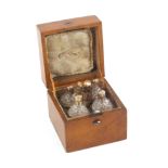 A fine early 19th Century French perfume set, contained in a grained tan leather square form box,