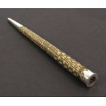 An early 19th Century Dutch knitting stick, of tapering cylinder form decorated in quill work