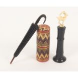 Two needle cases and a waxer, comprising a fine carved and turned horn standing needle case