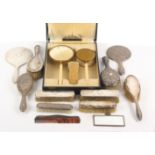 Silver backed brushes, mirrors, etc., comprising two brushes and a hand mirror with embossed