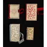 Four 19th Century bone and ivory needle books, comprising a carved and fret cut example with