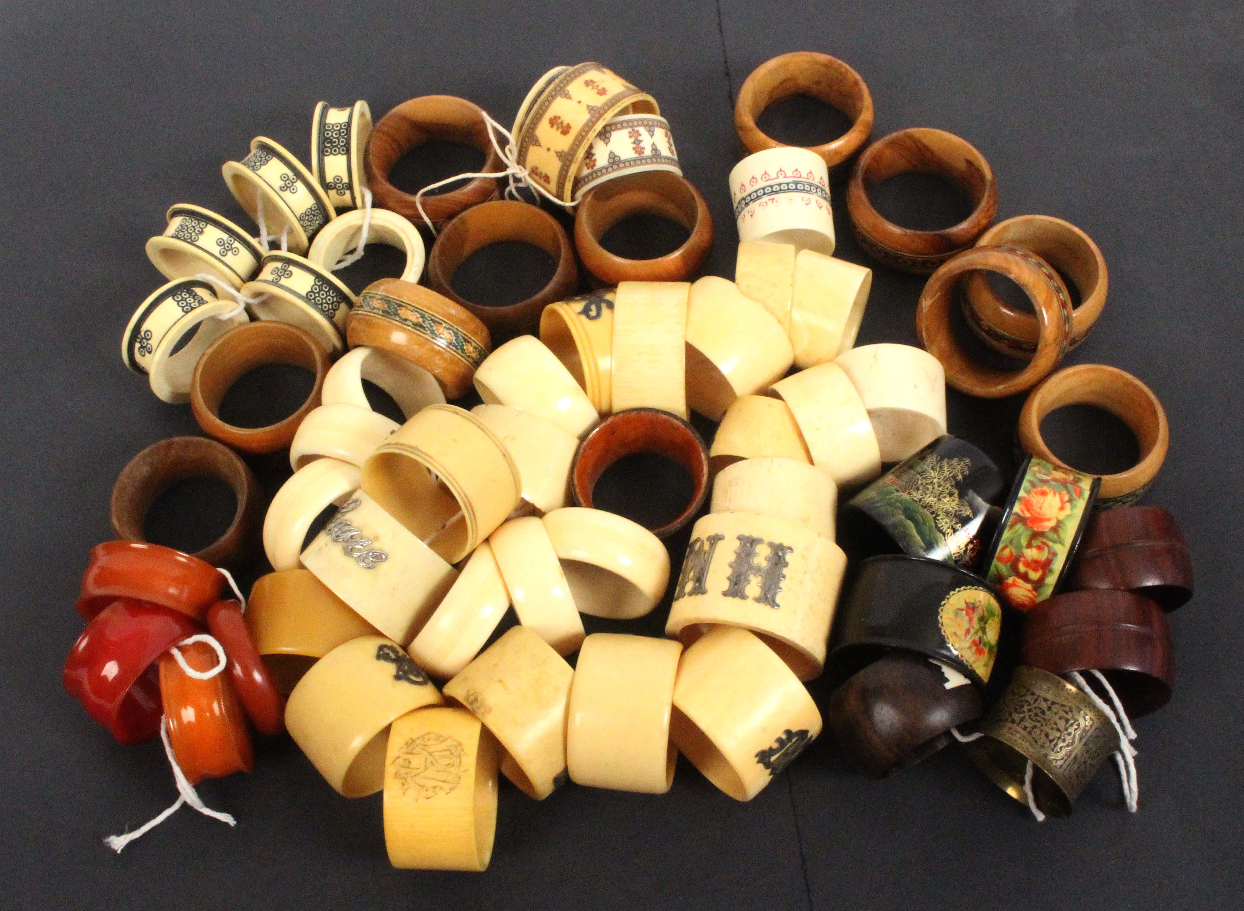 Napkin rings, a set of six 19th Century ivory examples, twenty bone and ivory mostly with applied