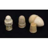 Two 19th Century ivory thimble cases and an ivory thimble, comprising an egg form example with