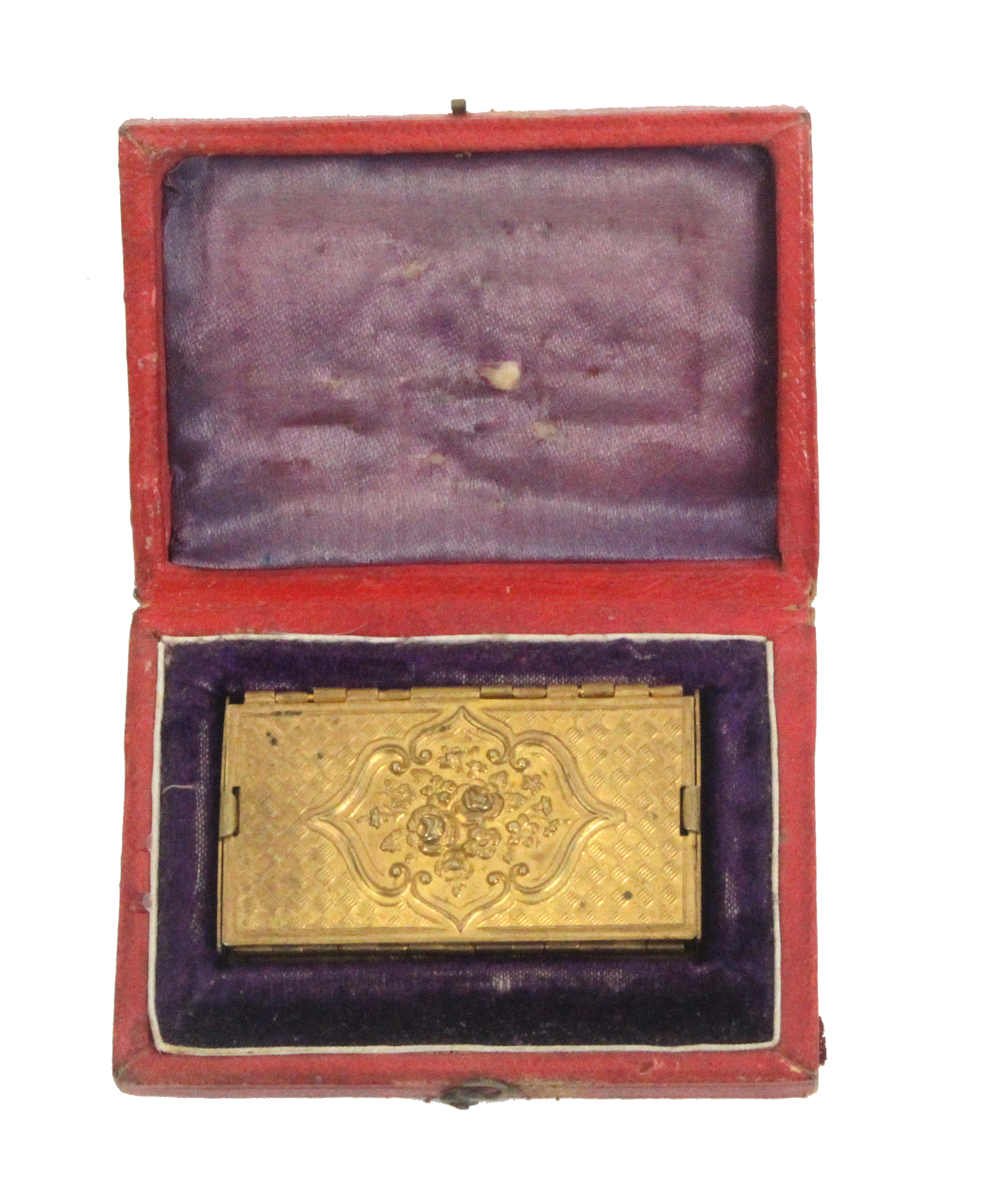 A gilt brass Avery accordion needle packet case ‘Beatrice’, four sections, in original red leather