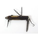 A late 19th century pocket knife initialled and dated 1893, fitted with two blades one locking,