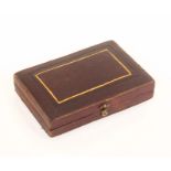 A rare Beatrice Avery style gilt brass needle packet case in original presentation case, the four