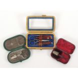 Three small leather cased sewing sets, comprising a brown leather rectangular example with glazed