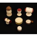 Seven 19th Century bone and ivory pin cushions, comprising two double ended pedestal examples,