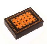 A Tunbridge ware rectangular ebony or partridge wood card box, the hinged lid with a panel of