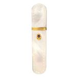 A Palais Royal mother of pearl needle case, of rectangular curved end form one side with gilt and