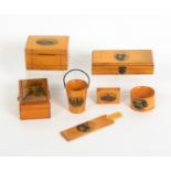Mauchline ware – seven pieces, comprising a rectangular money box (The Pier, Hastings), 9cms, a