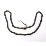 A string of ancient glass beads, probably Egyptian, all of cylinder form strung as a necklace,  78