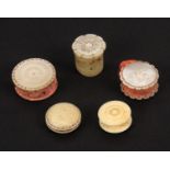 Five pin cushions and waxers, comprising two mother of pearl disc form pin cushions one with cut