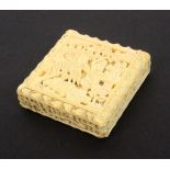 A good early 19th Century Canton carved ivory Tangram puzzle, the square box with sliding lid and