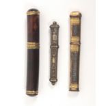 Three early 19th Century needle and bodkin cases, comprising a tortoiseshell cylinder example with