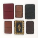 Six 19th Century leather card cases, all with pull off tops including a clean maroon leather