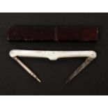 A combination pocket knife and propelling pencil by Joseph Rodgers,  mother of pearl scales, blade