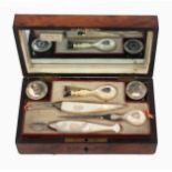 A Palais Royal writing set contained in a burr yew wood rectangular box, edged in ebony the lid with