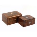 Two late Victorian sewing boxes, comprising a figured walnut example of rectangular form and
