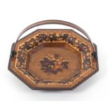 A Tunbridge ware rosewood and birds eye maple octagonal sewing basket, the twin timber swing