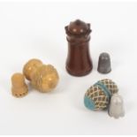 Three thimble cases, comprising an early 19th Century bone egg covered in coloured beadwork