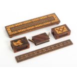 Tunbridge ware – four pieces and another, comprising a geometric mosaic cribbage board, 22.5cms, a