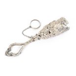 A continental white metal posey holder, formed as a fruiting vine on an open work handle with